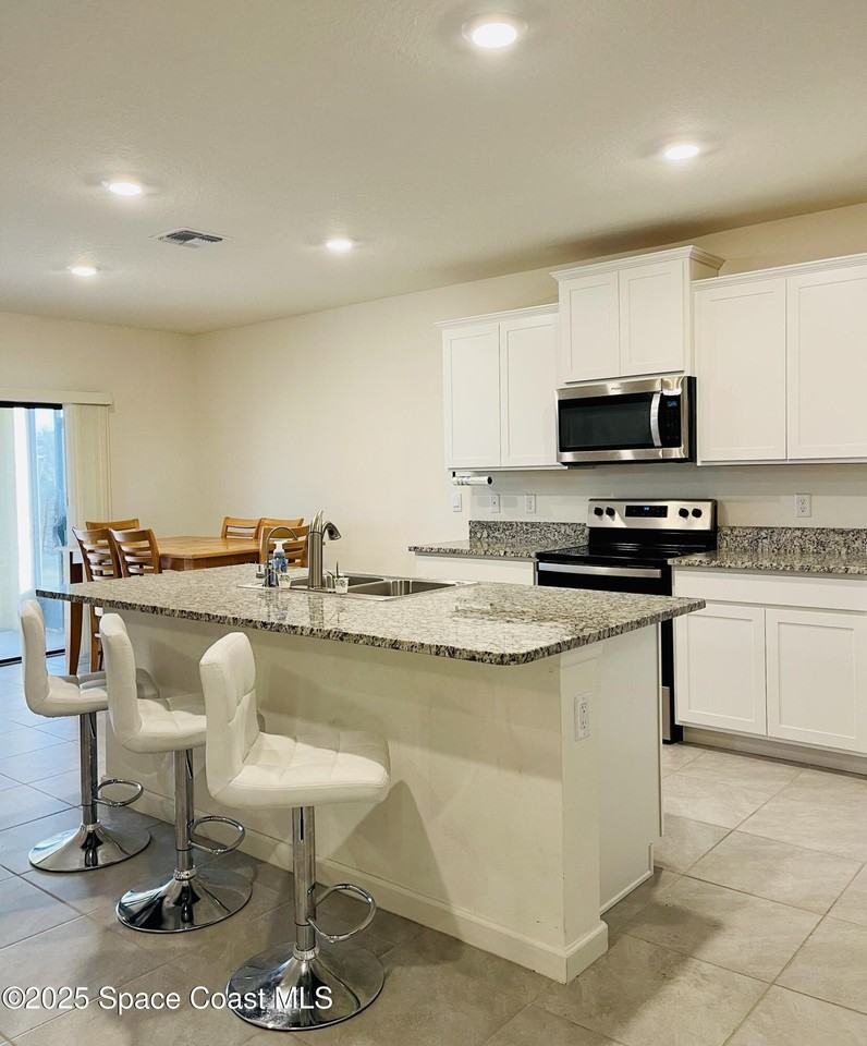 7351 Amethyst Ave - Photo 5 of 36