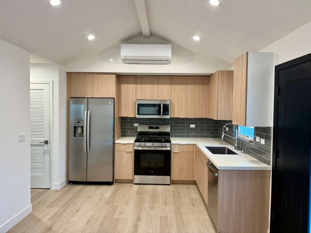 5974 Jamieson Ave - Photo 3 of 4