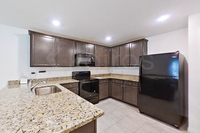 8460 Indian Laurel Ln - Photo 2 of 5