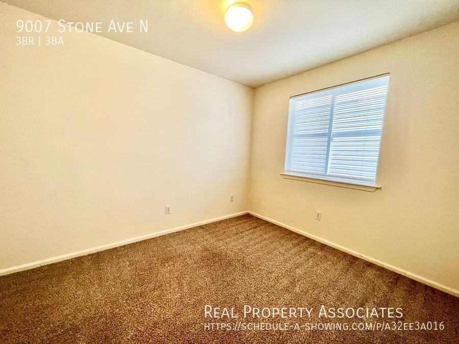9007 Stone Ave N - Photo 4 of 33