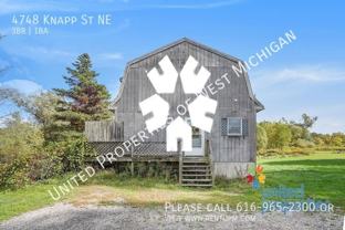 4748 Knapp St Ne - Photo 1 of 1