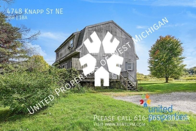 4748 Knapp St Ne - Photo 2 of 21