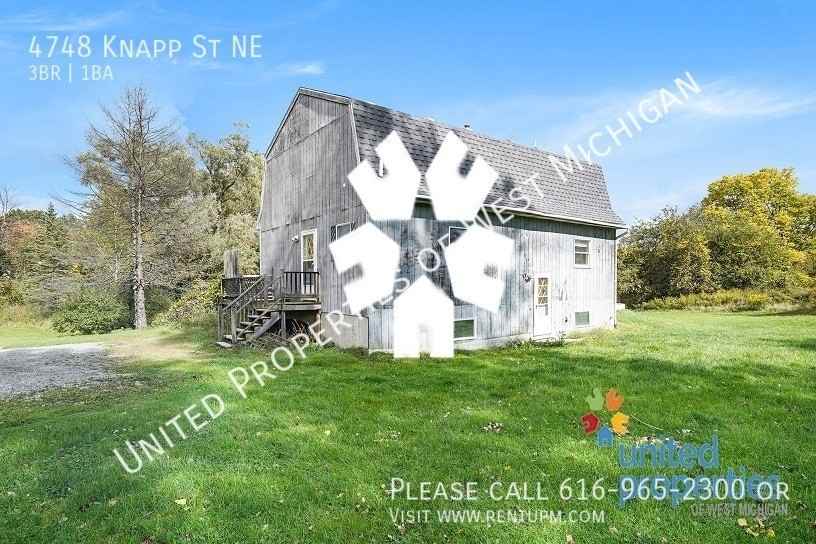 4748 Knapp St Ne - Photo 3 of 21