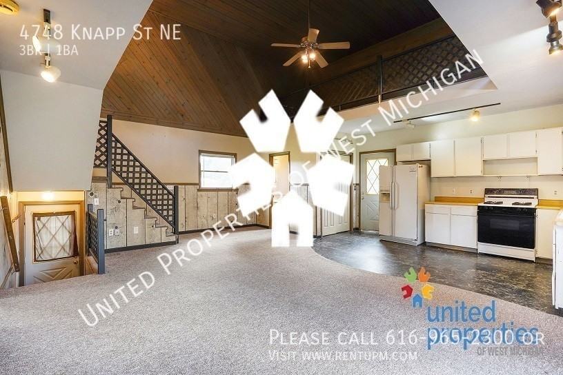 4748 Knapp St Ne - Photo 5 of 21