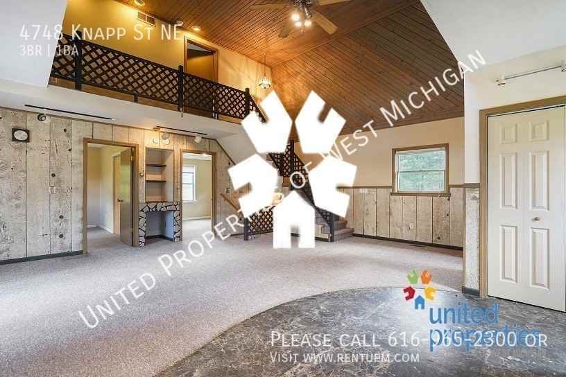 4748 Knapp St Ne - Photo 7 of 21