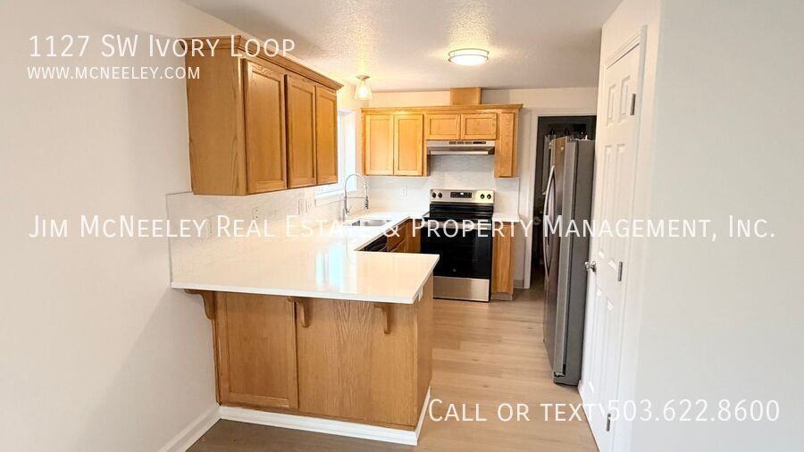 1127 Sw Ivory Loop - Photo 6 of 25