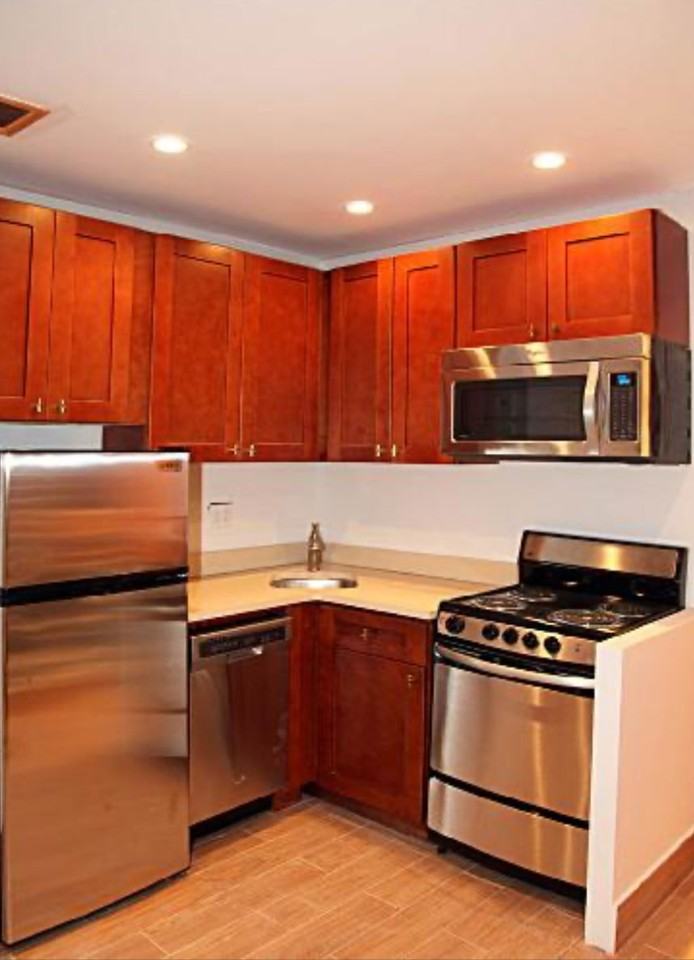 E 54th St - Photo 3 of 6