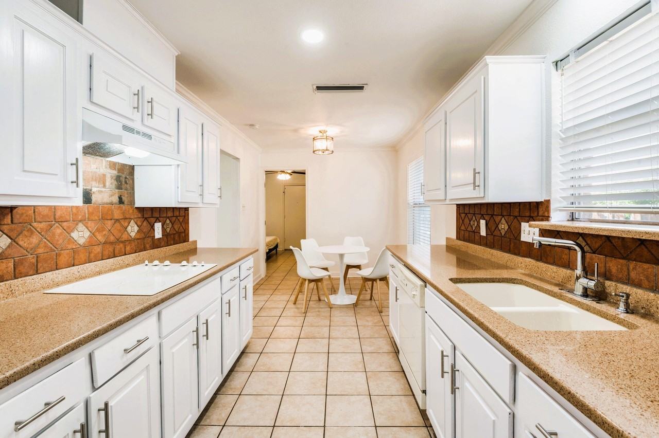 Louisville Dr - Photo 2 of 14