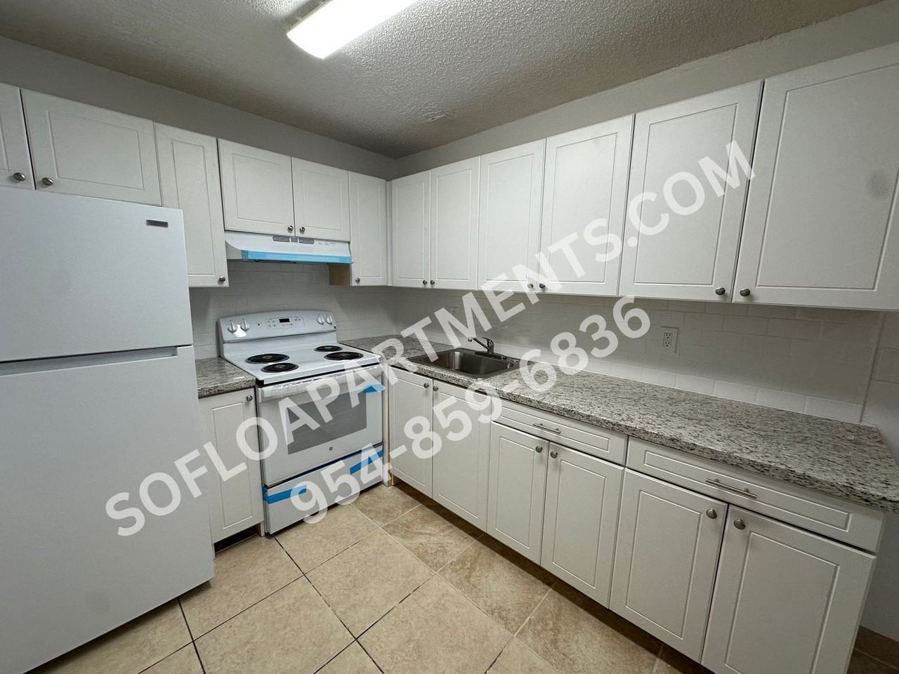 410 NW 35 St - Photo 5 of 22