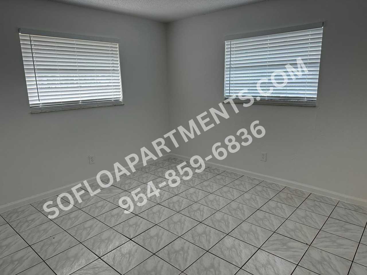 410 NW 35 St - Photo 7 of 22