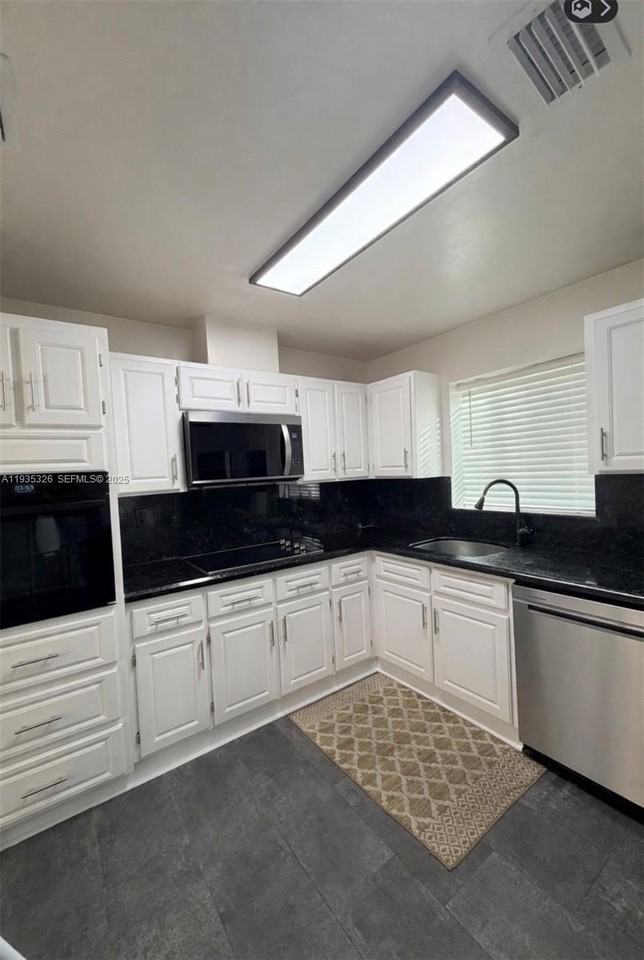 775 Nw 177th Ter - Photo 6 of 18