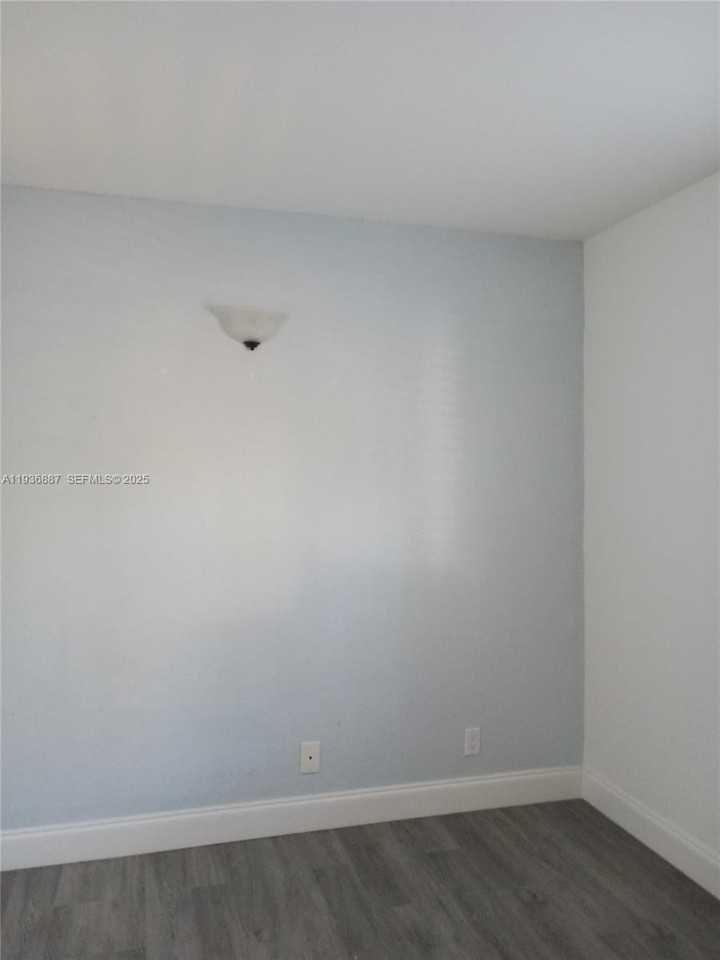 405 Gardens Dr #102 - Photo 3 of 7