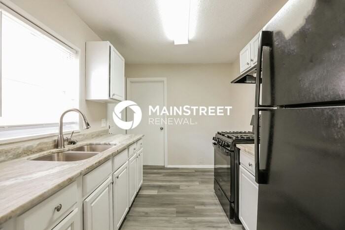 1435 E 66th Ter - Photo 6 of 17