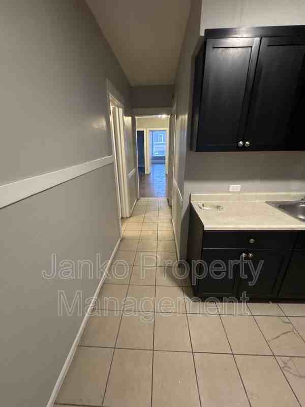 7132 S Ingleside Ave #2 - Photo 2 of 8