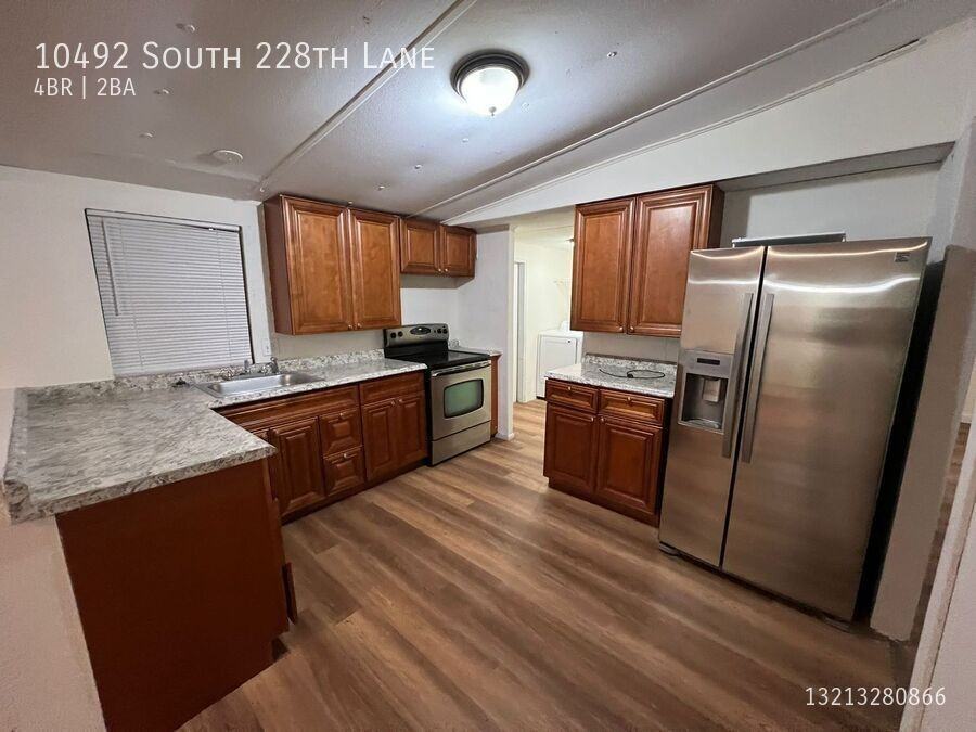 10492 S 228th Ln - Photo 5 of 18