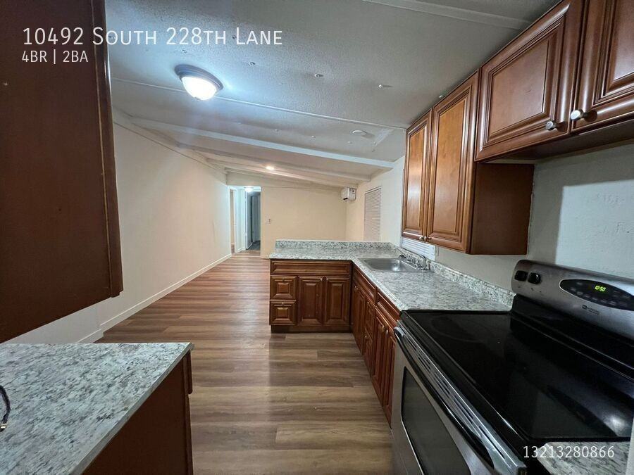 10492 S 228th Ln - Photo 7 of 18