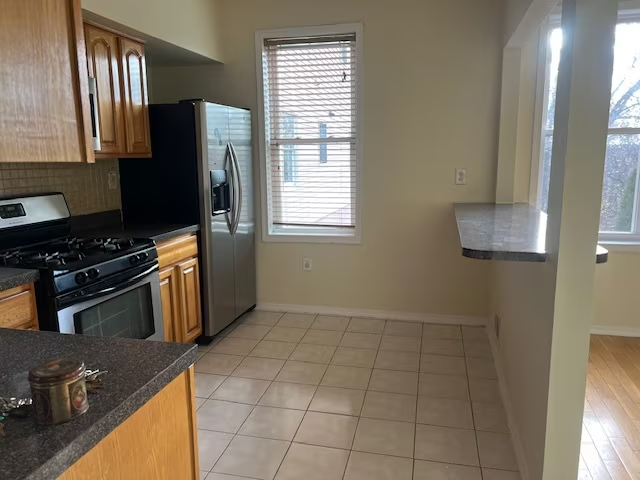 1141 50th St #1 - Photo 3 of 11