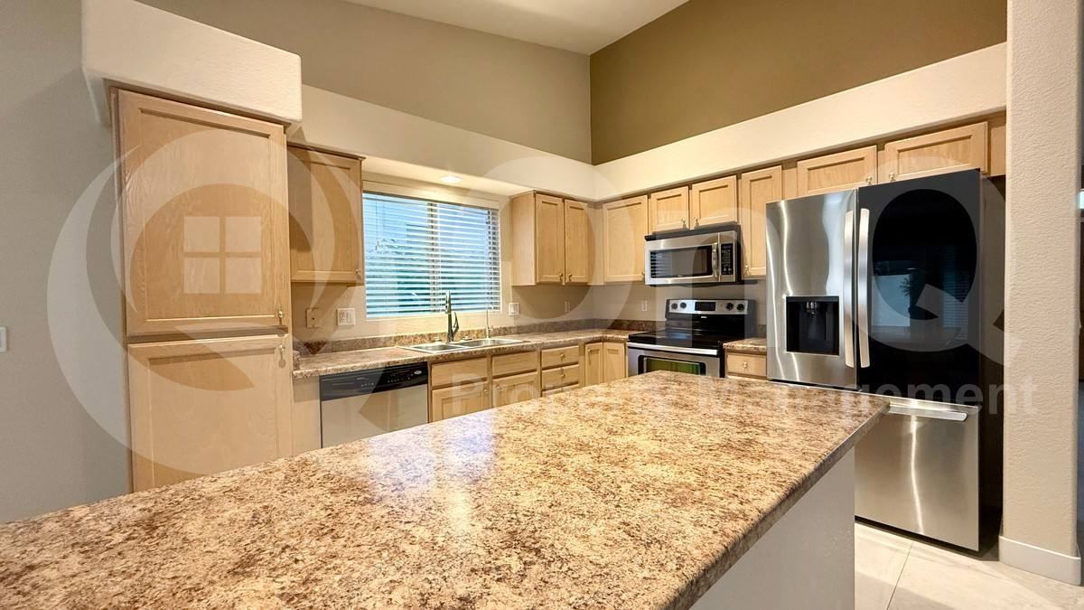 10828 W Utopia Rd - Photo 4 of 10