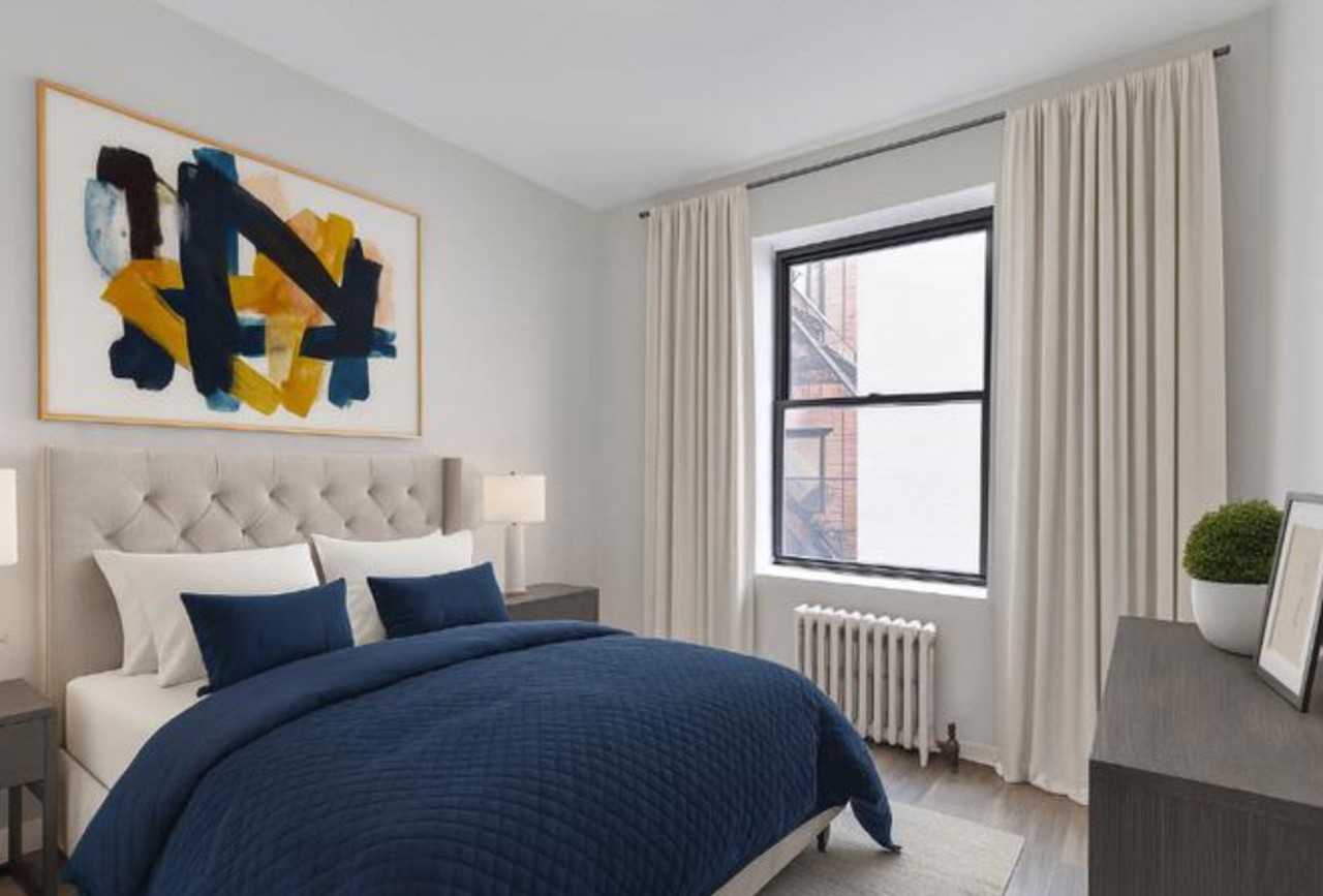 E 106th St - Photo 2 of 4