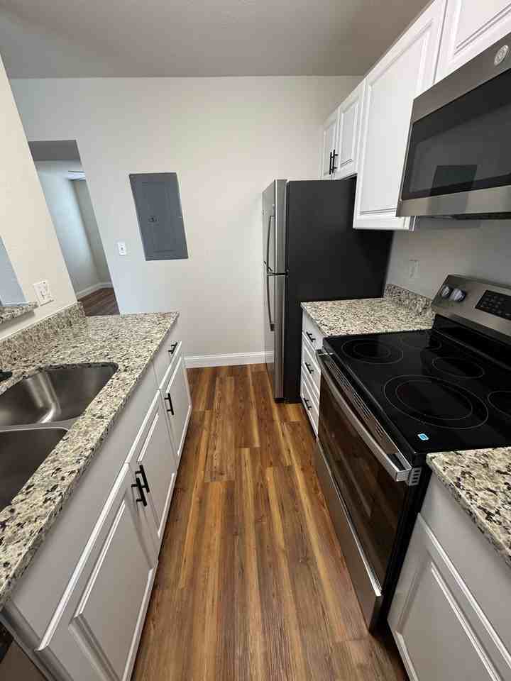 Summer Tree Townhomes, LLC - Photo 3 of 38