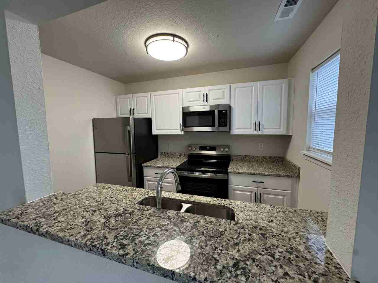 Summer Tree Townhomes, LLC - Photo 3 of 24