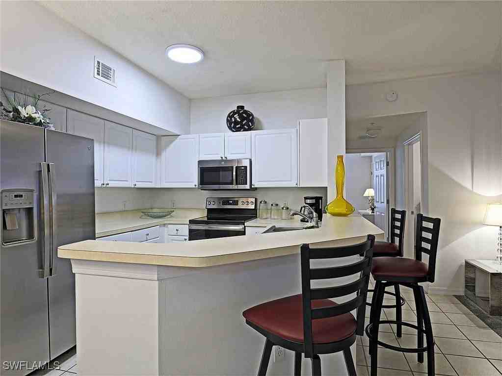 15645 Ocean Walk Cir Apt 116 #116 - Photo 3 of 32