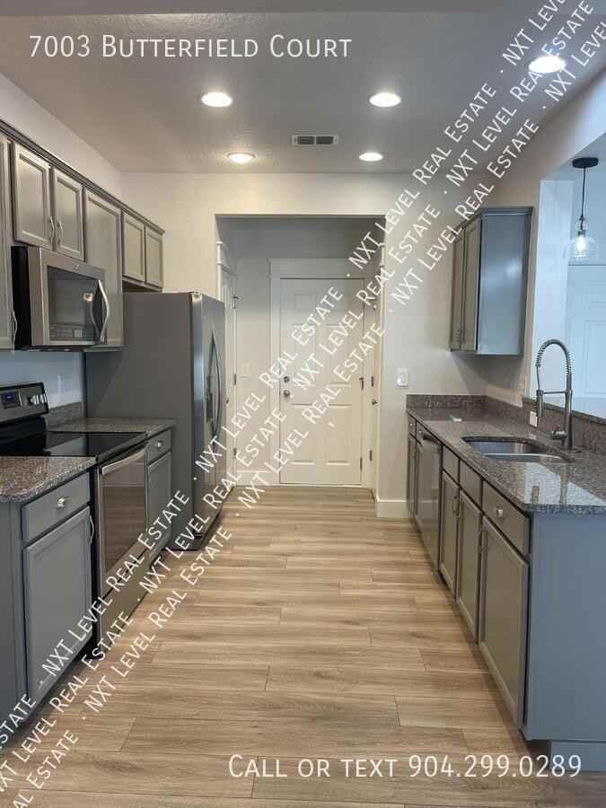 7003 Butterfield Ct - Photo 2 of 17