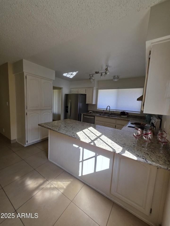 10470 E Clinton St - Photo 2 of 24