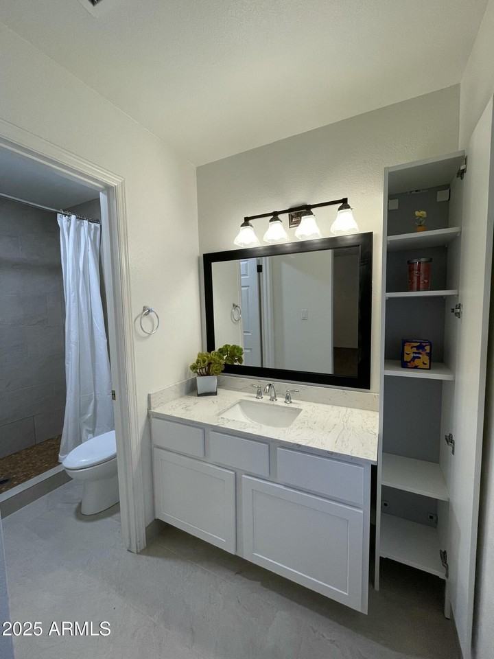 10470 E Clinton St - Photo 6 of 24