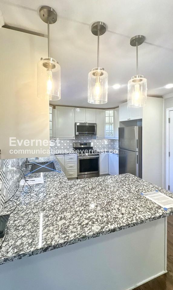 7624 Nall Ave - Photo 5 of 29