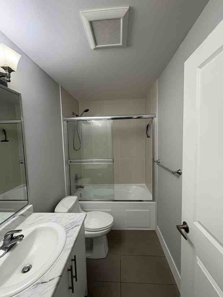 7645 210 Street - Photo 2 of 9