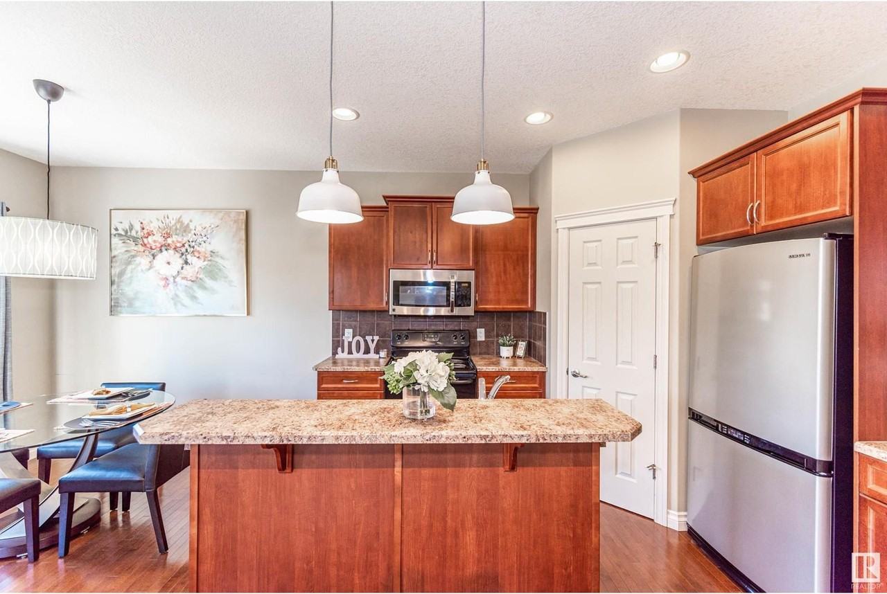 Semi-Furnished 3 Bedroom, 2.5 Bathroom Full House with Rear Garage | SF329 - Photo 3 of 9