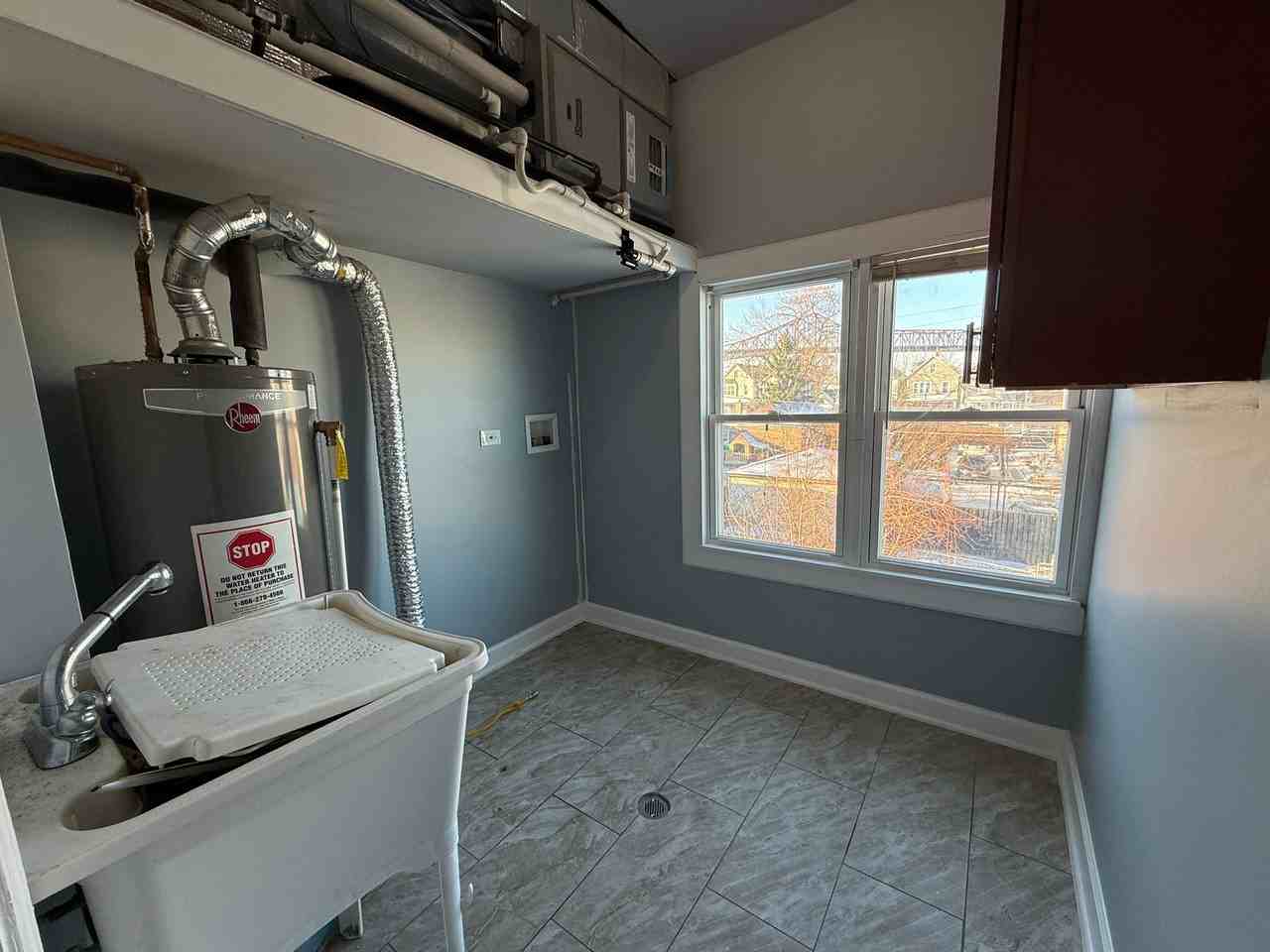 Available Now – East Side Neighborhood - Photo 7 of 12