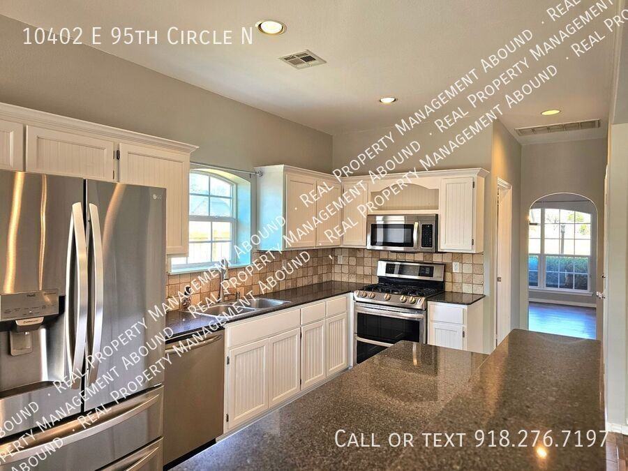 10402 E 95th Cir N - Photo 7 of 39