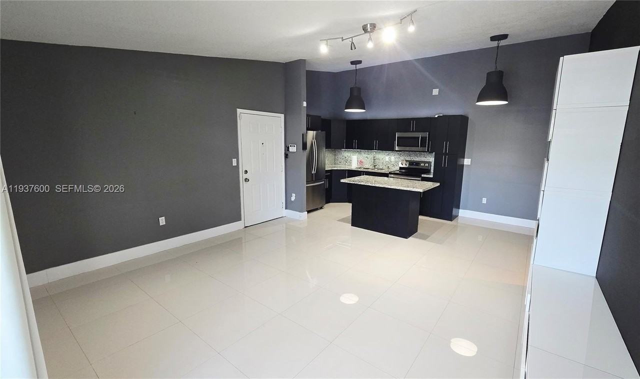 18785 Nw 62nd Ave #208 - Photo 2 of 16