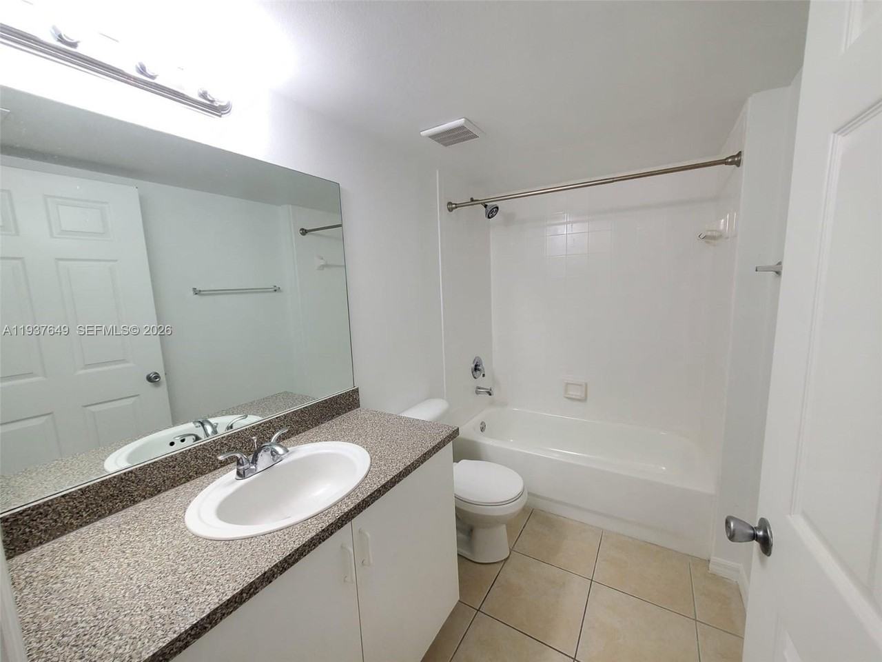 5041 Wiles Rd #106 - Photo 3 of 25