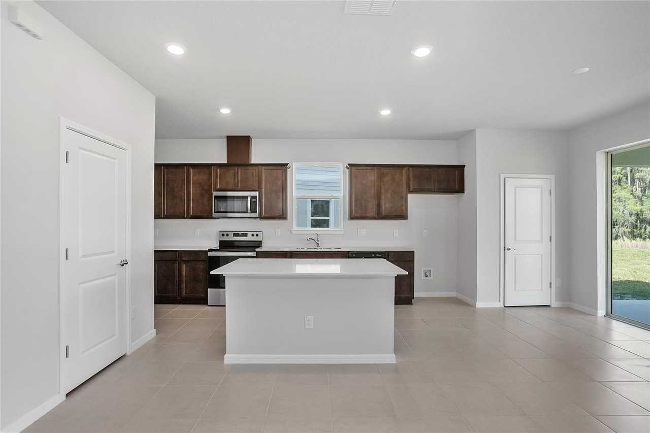 10822 Windswept Garden Way - Photo 5 of 35