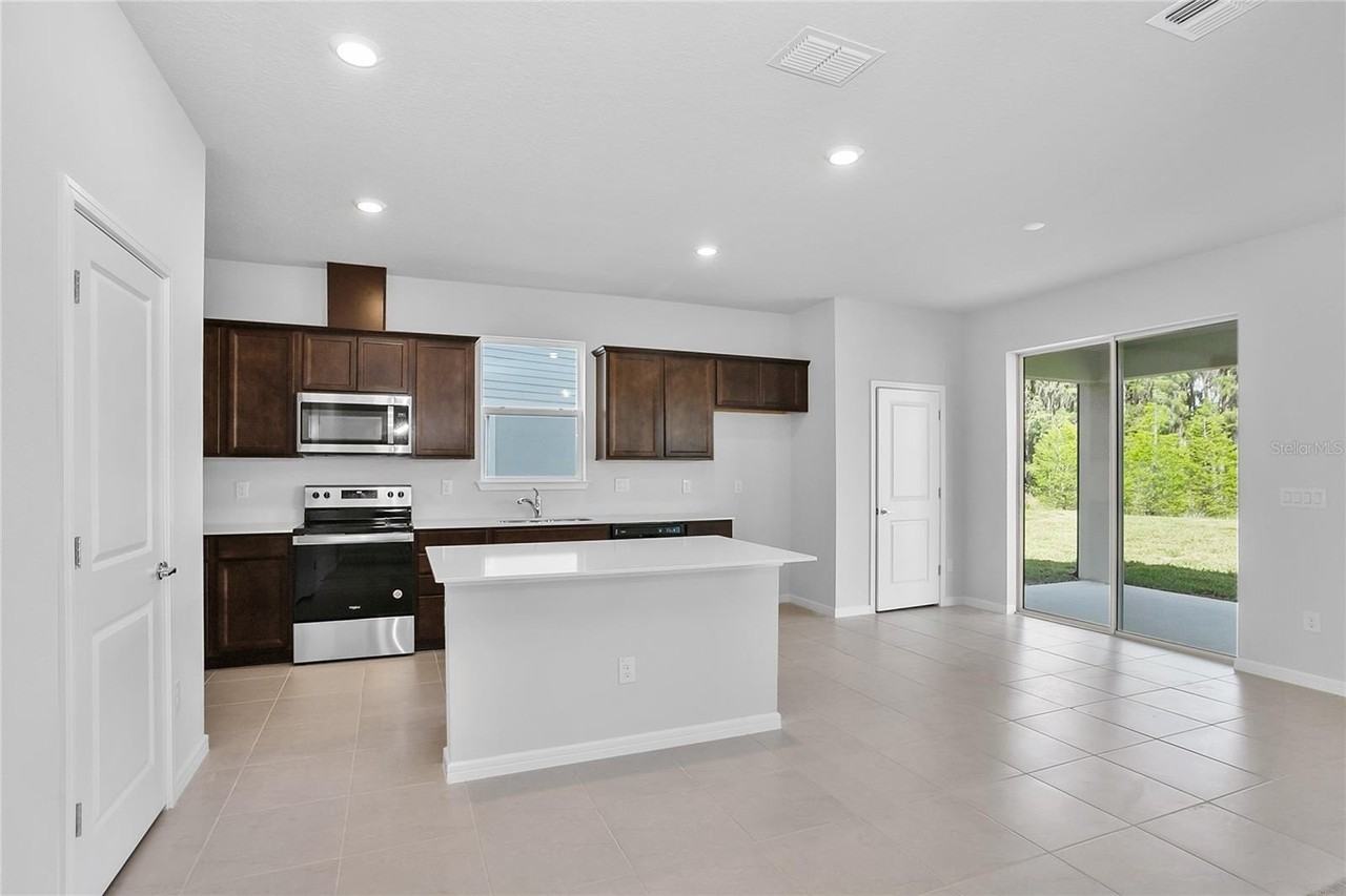 10822 Windswept Garden Way - Photo 6 of 35