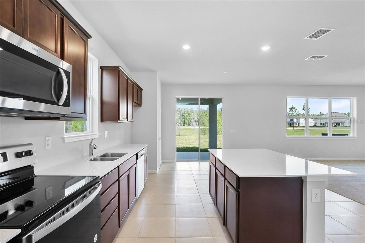 10822 Windswept Garden Way - Photo 7 of 35