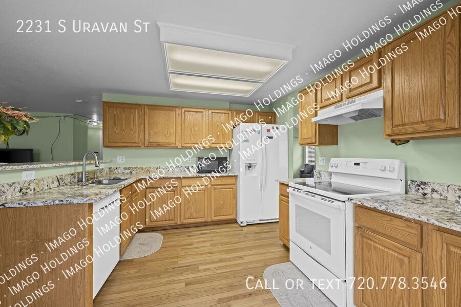 2231 S Uravan St - Photo 7 of 29