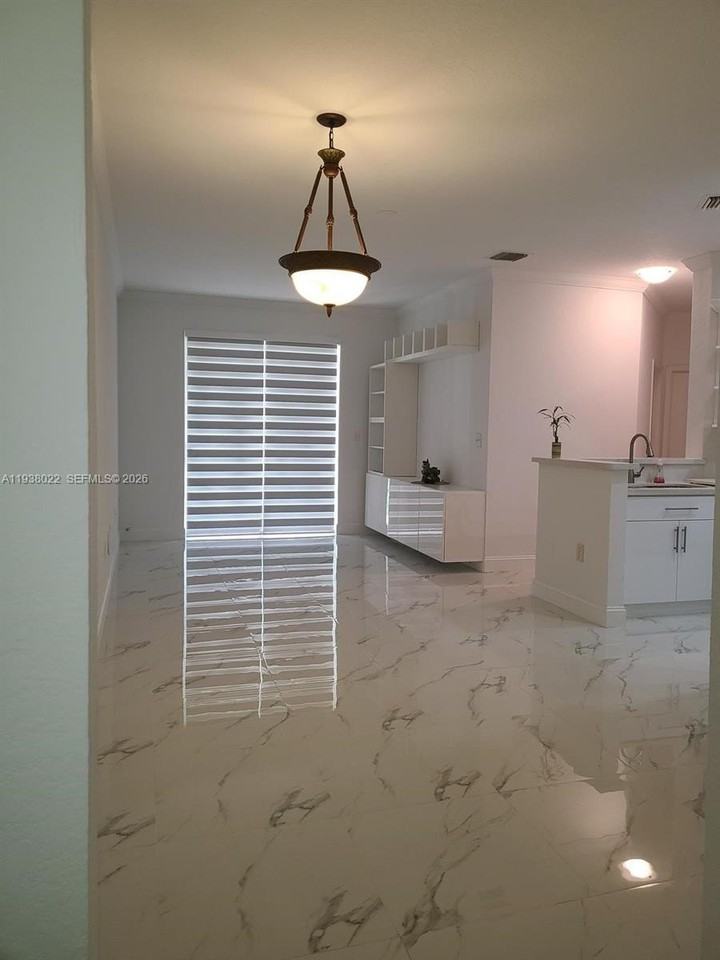 7200 Nw 177th St #106-7 - Photo 3 of 21