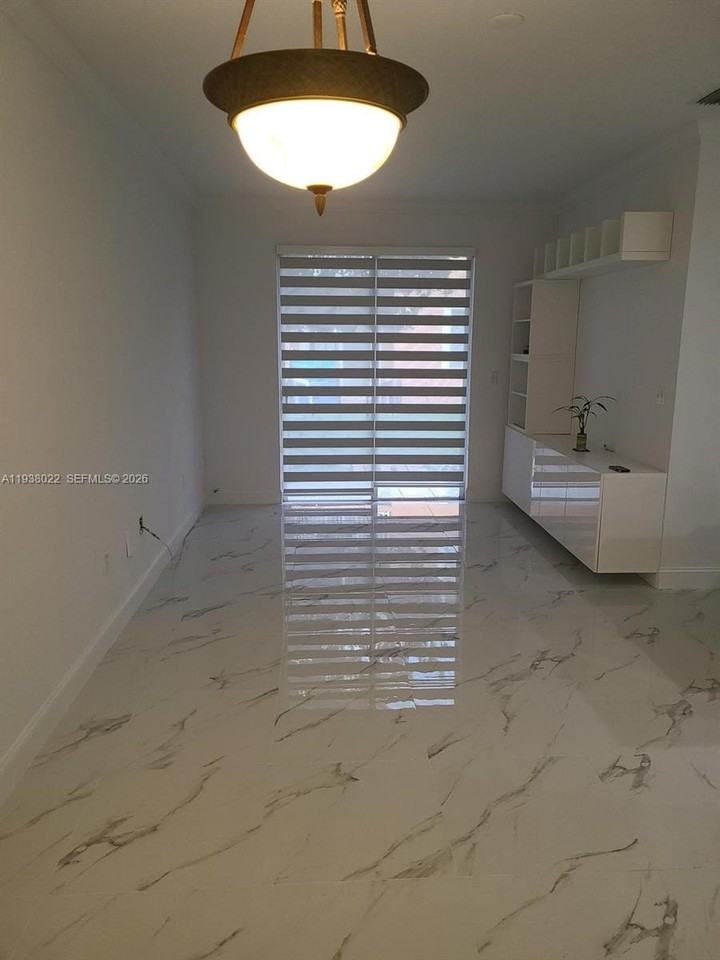 7200 Nw 177th St #106-7 - Photo 4 of 21