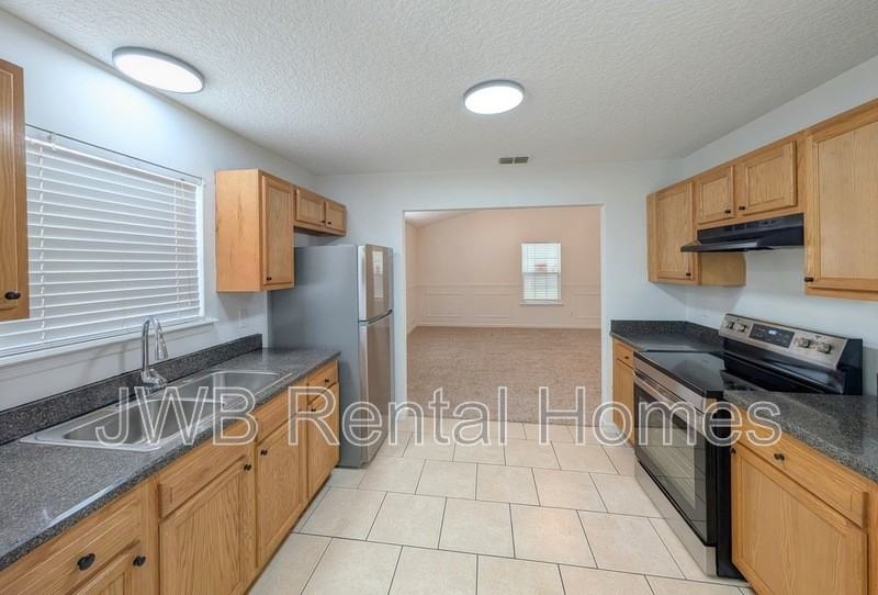 9060 3rd Ave - Photo 4 of 15