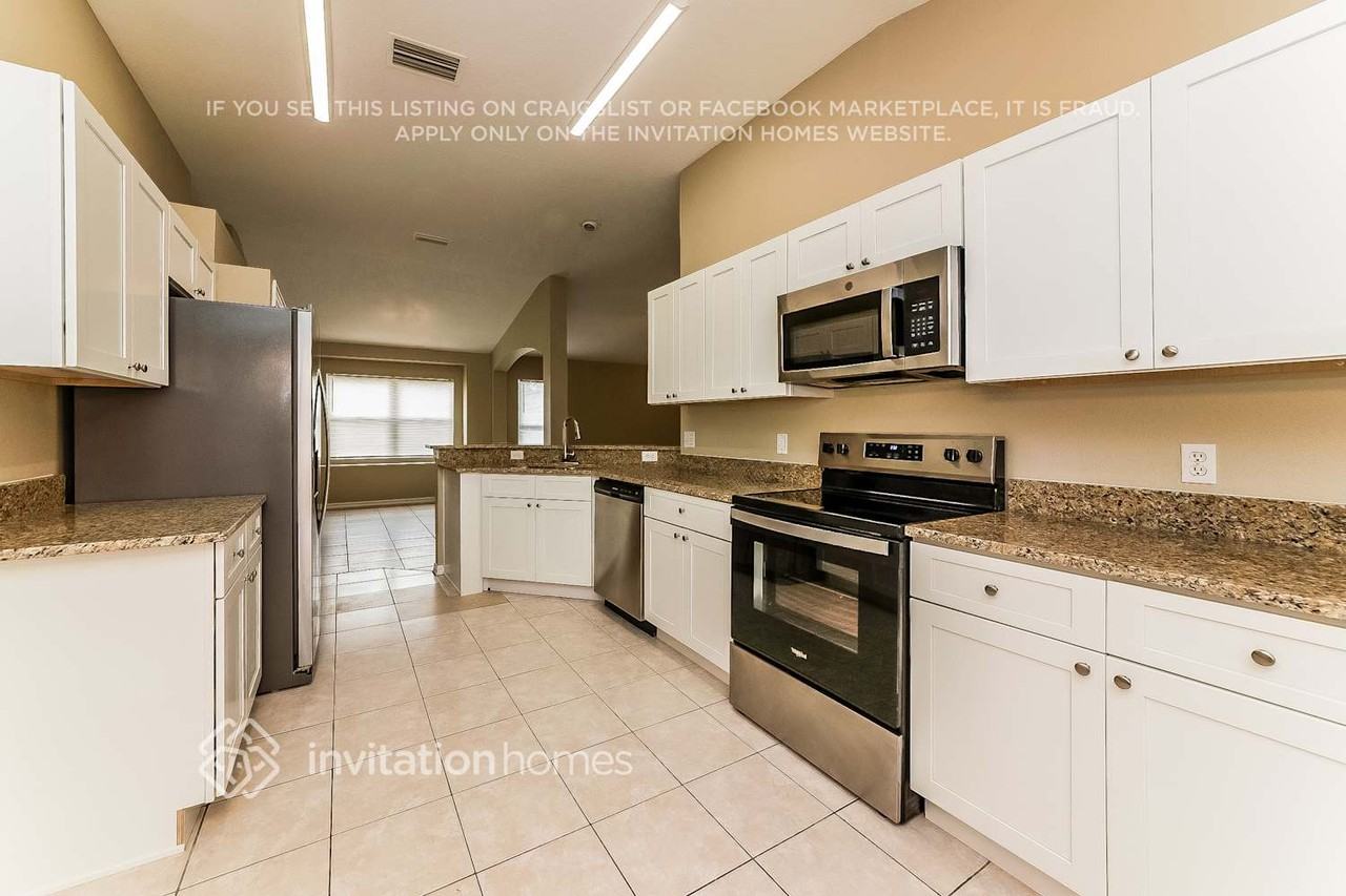 11801 Acorn Woods Ter - Photo 6 of 17