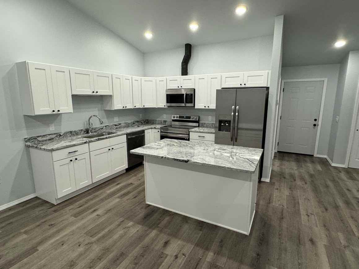 Rosalie Duplexes - Photo 7 of 19