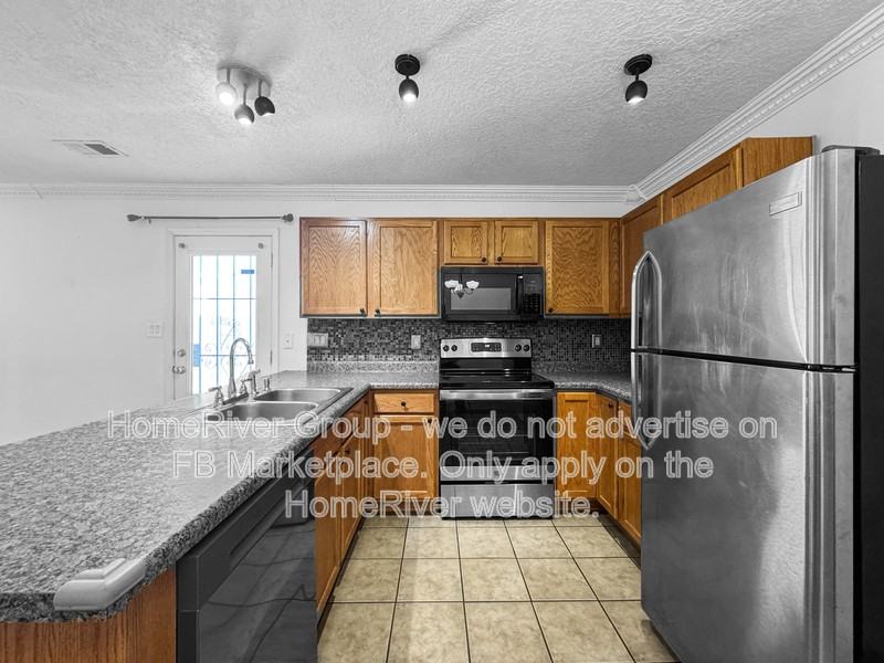 728 Mesa Del Rio St Nw - Photo 2 of 21