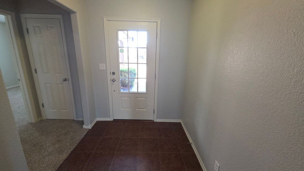 10720 N 153rd East Ave - Photo 3 of 41