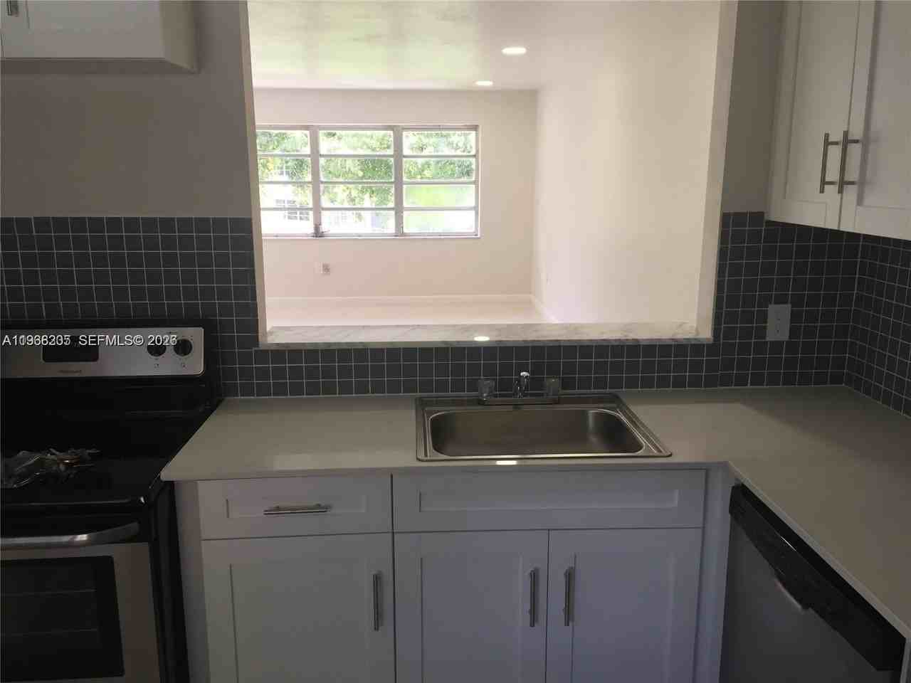 1550 Ne 191st St #309 - Photo 4 of 13