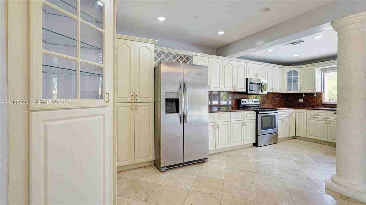 1299 W 77th St - Photo 3 of 30