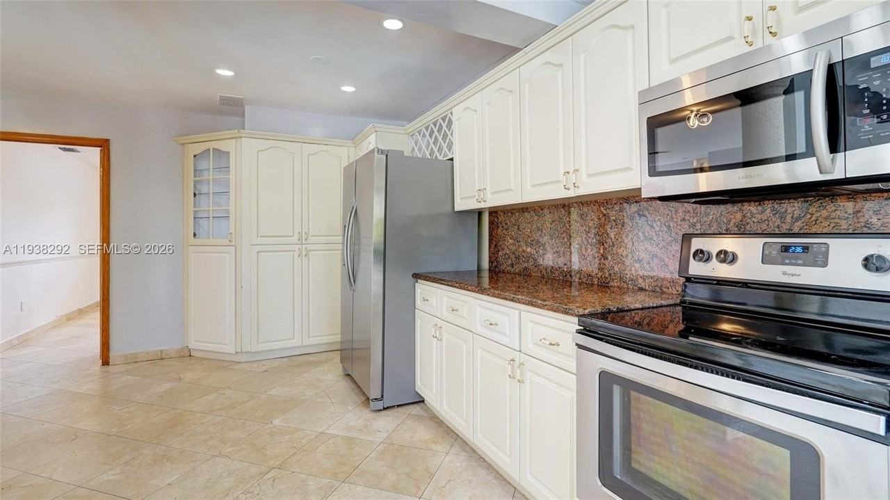 1299 W 77th St - Photo 4 of 30